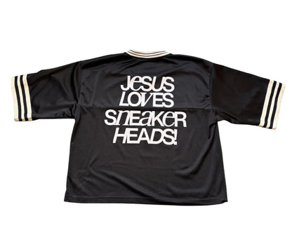 Black jacket with 'Jesus Loves Sneaker Heads!' text on full back